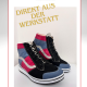 Zwei moderne orthopädische Schuhe in Schwarz, Blau und Pink stehen auf einem weißen Hintergrund. Darüber steht der Schriftzug „Direkt aus der Werkstatt“. Das Logo von Schuster Schalk, Orthopädieschuhmacher & Sanitätshaus, ist oben zu sehen.